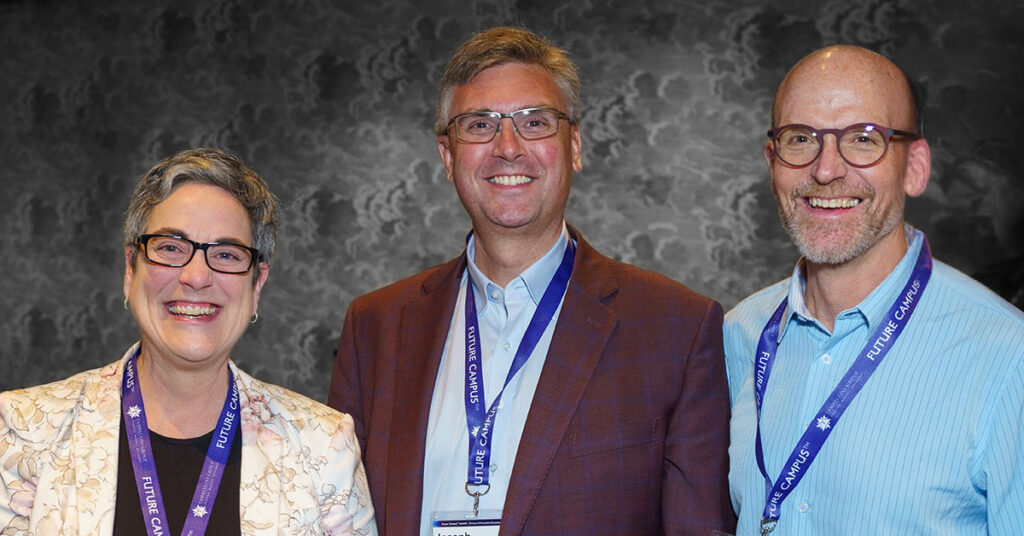 three higher ed executives smiling at the Future Campus Summit